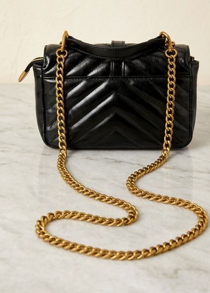 ￼ SaintLaurent luxury black purse ￼
