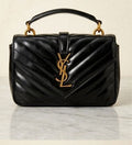 ￼ SaintLaurent luxury black purse ￼